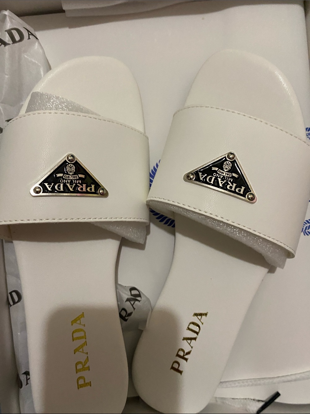 Prada White Leather Logo Slide Sandals with Silver Plaque